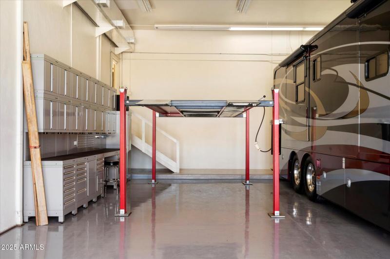 Impressive RV Garage w/ Lift & Storage