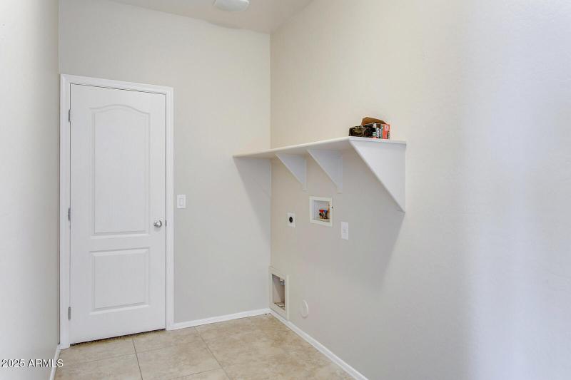 main floor laundry room and large closet