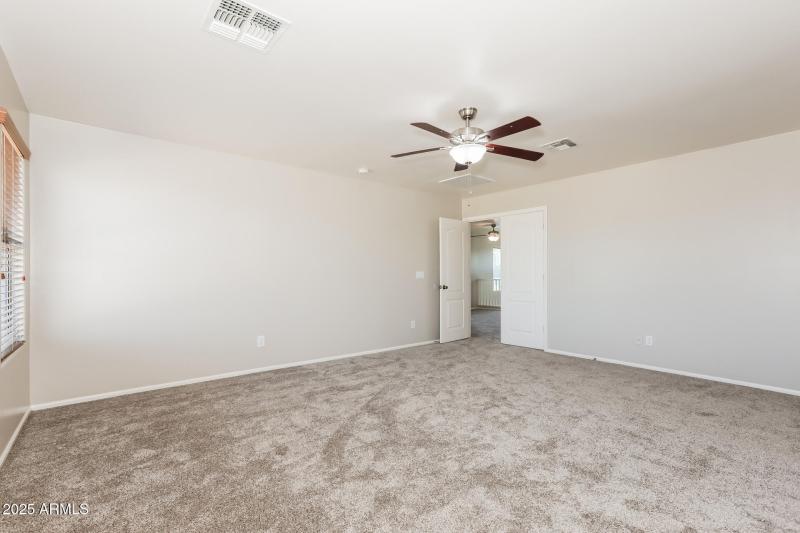 11-photo-Main-Bedroom-e61372ac-4c03-4af5