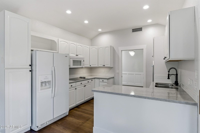 Updated kitchen with ample cabinets