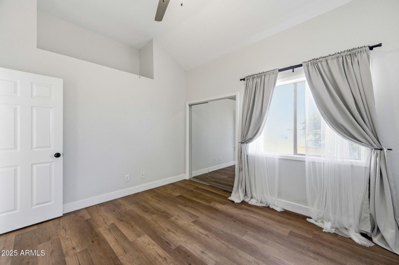 Second bedroom with ceiling fan