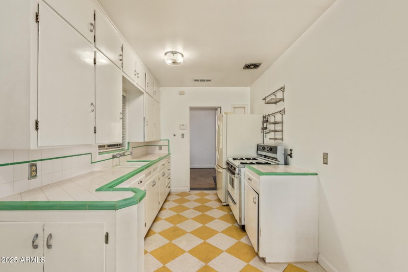 Vintage cabinets & tile countertops