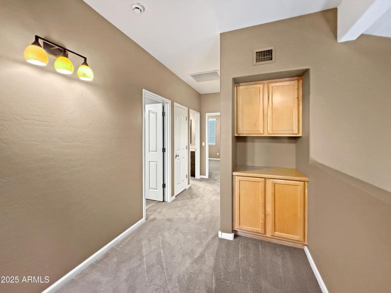 Upstairs Hallway with Storage Cabinets