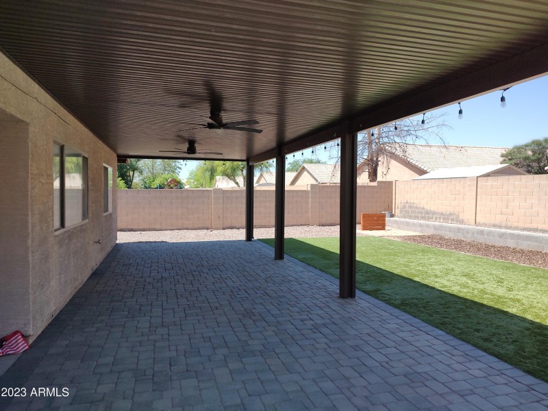 etended patio with ceiling fans