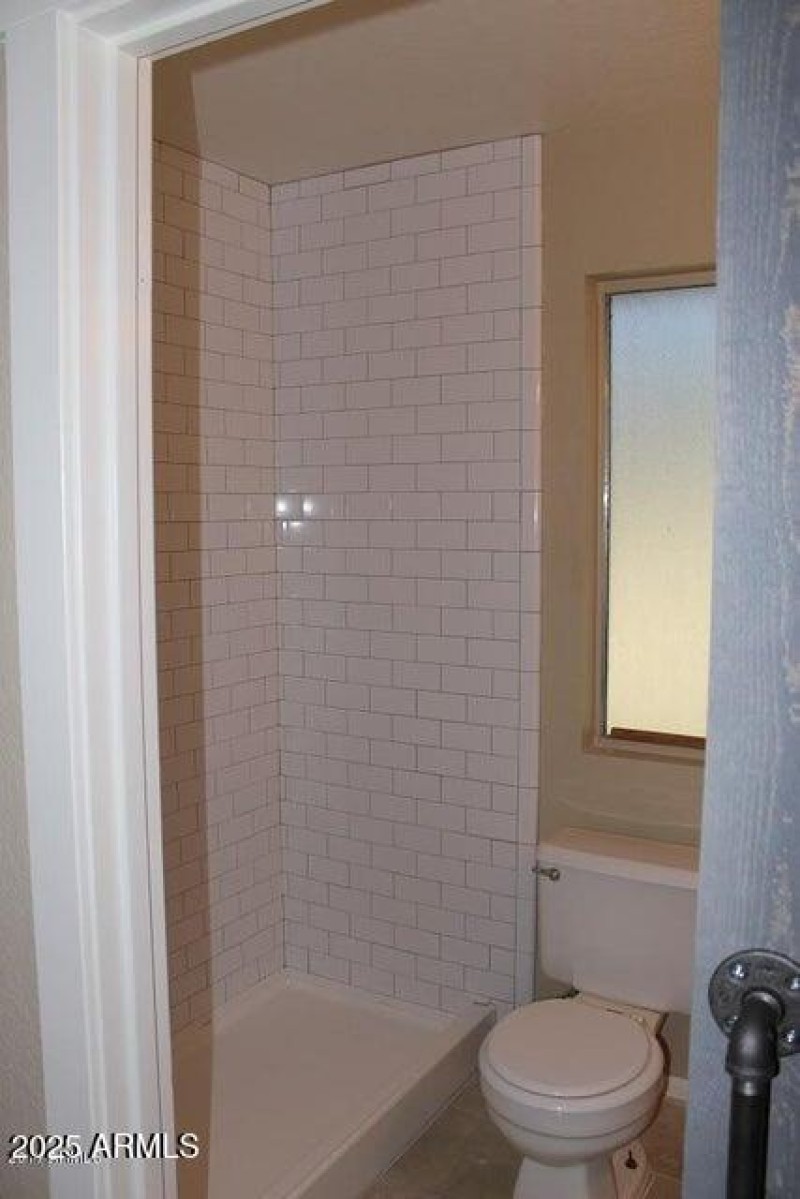 Primary Bathroom with Tiled Shower
