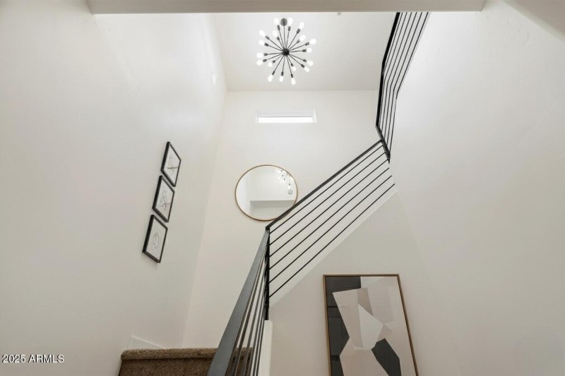 Stairs to 2nd level at Front entry