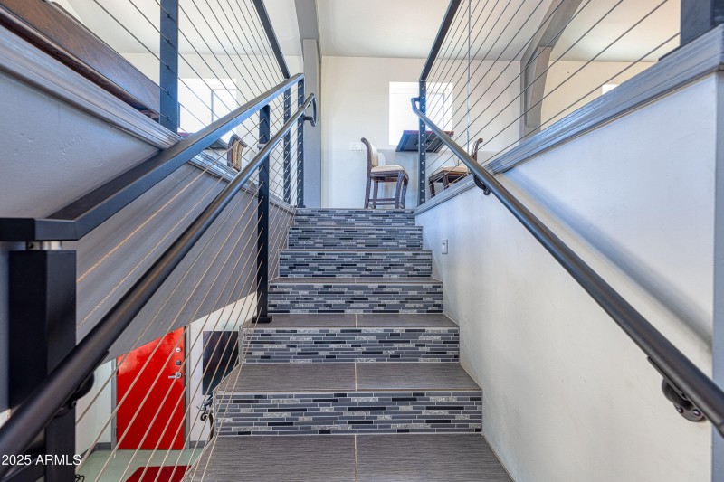 Stairway to upper level Patio