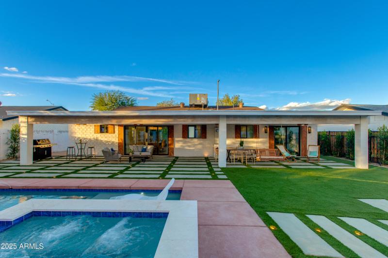 VIEW OF THE HOME FROM THE POOL