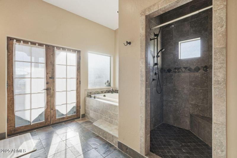 French doors to covered patio and pool