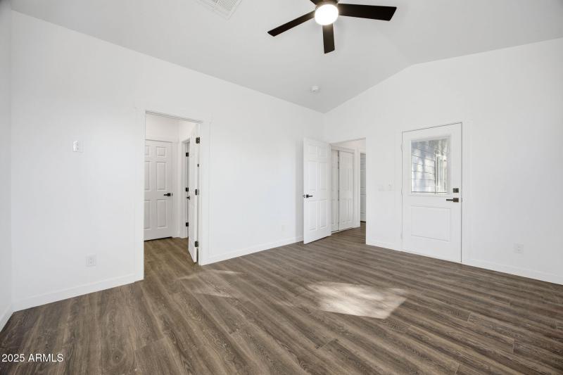 Primary bedroom facing bath