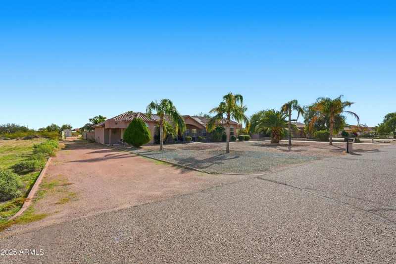 North driveway leading to backyard