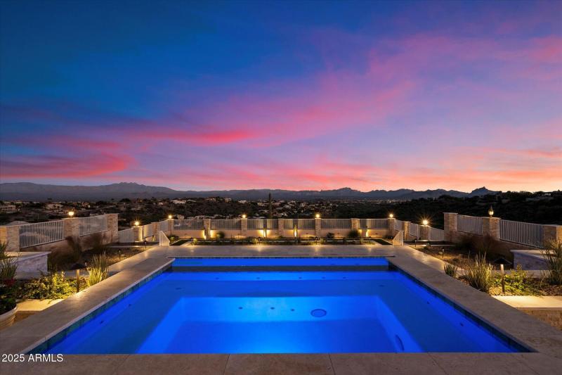 Illuminated Pool Overlooking Acreage