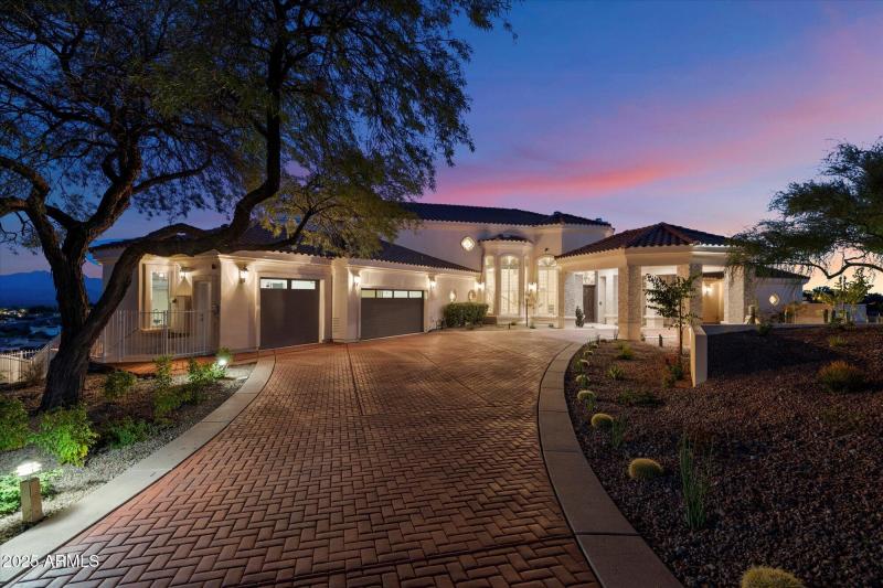 Grand Entrance with Paver Driveway