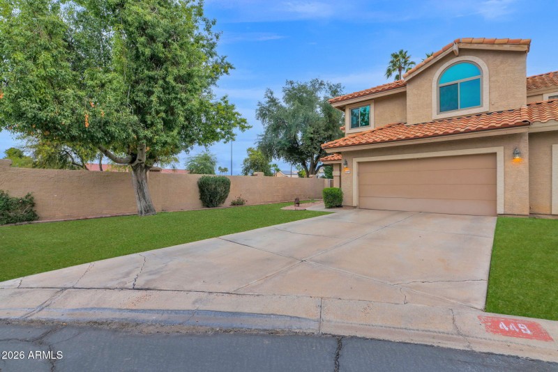 End Unit, 2 car garage, lots of parking