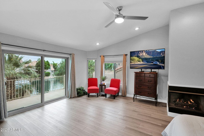 Primary w Balcony & Gas Fireplace