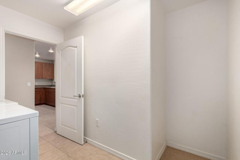 31-Laundry Room with storage space