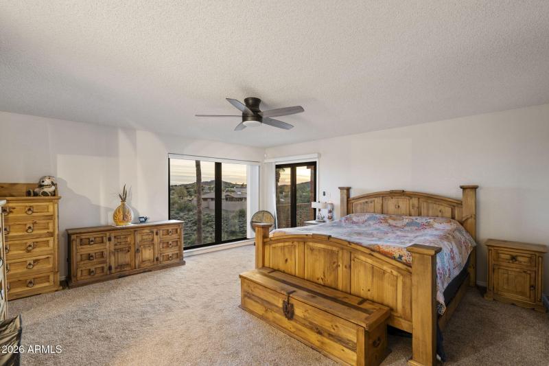 Primary Suite w balcony & mountain views