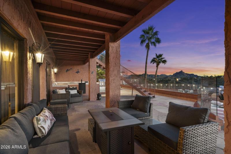 Covered Balcony w Arched Architecture