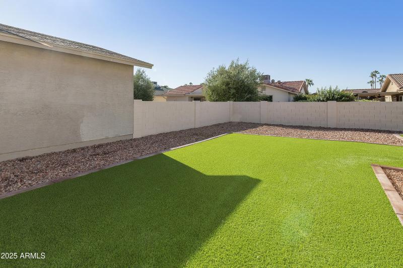 Yard with artificial turf