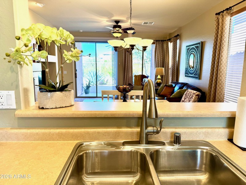 View of outdoors from Kitchen sink