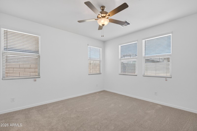 10) PRIMARY BEDROOM