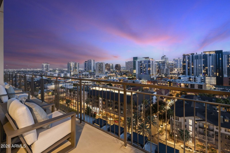 Balcony with City Skyline Views