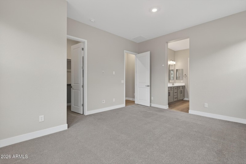 11) PRIMARY BEDROOM
