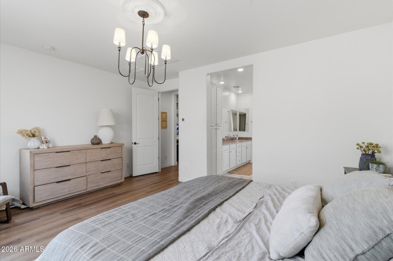Elegant Chandelier & Wood Flooring