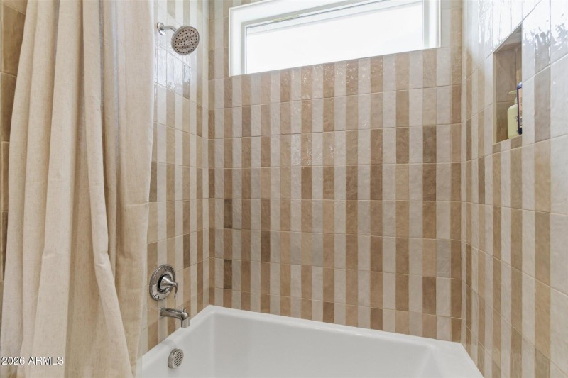 Tub & Shower w Tile & Natural Light