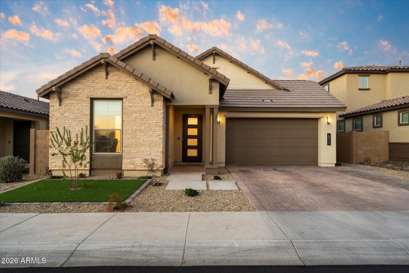 Paver Driventry, and two-car garage