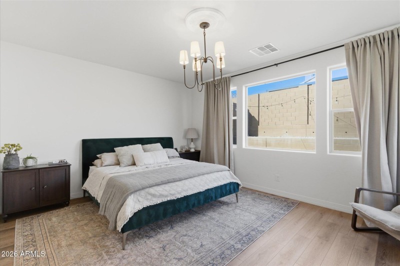 Primary Bedroom w Abundant Light