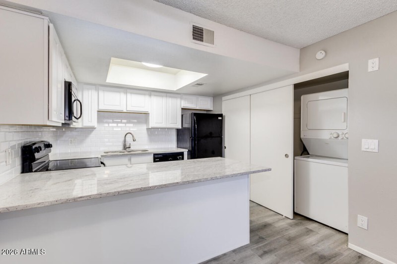 KITCHEN AND LAUNDRY AREA