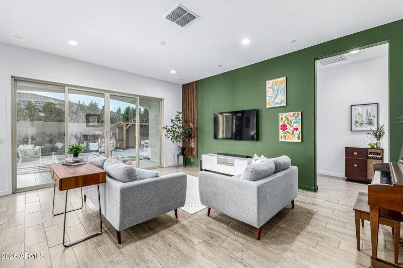 Family Room Open to Backyard Retreat