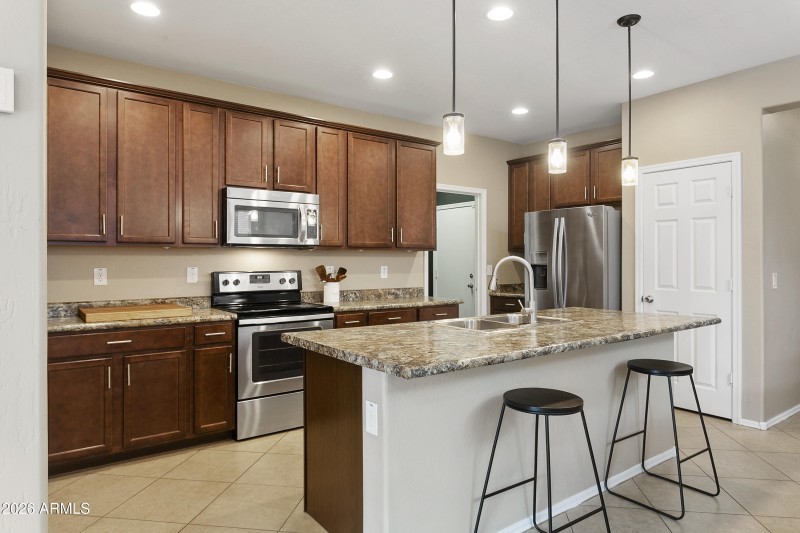 Kitchen with stainless steel appliances