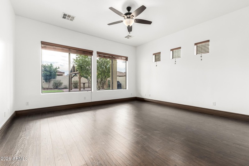 Spacious Bedroom with Wood Floors