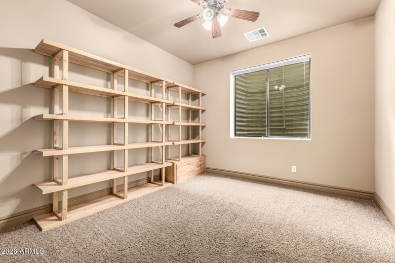 Bedroom with Custom Shelving