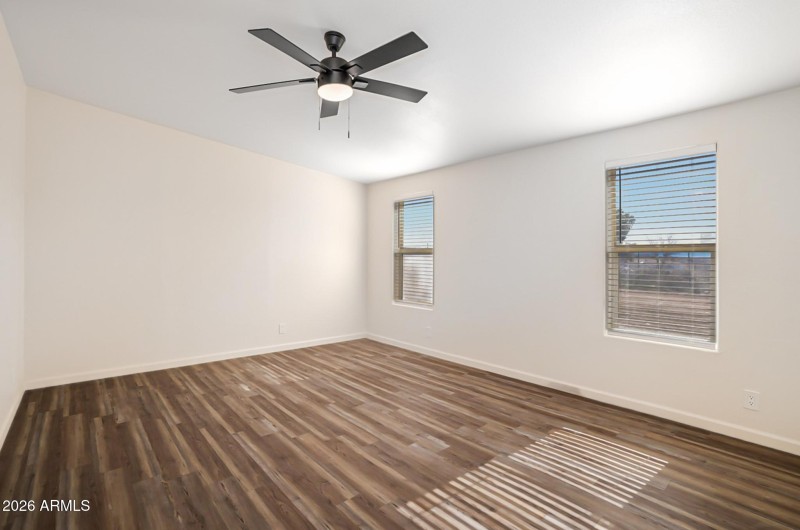 Spacious Bedroom With Ceiling Fan