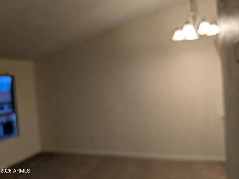 Living area with vaulted ceilings