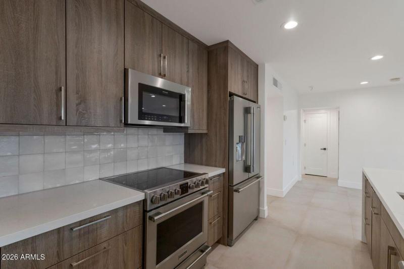 Custom touch-latch cabinetry.
