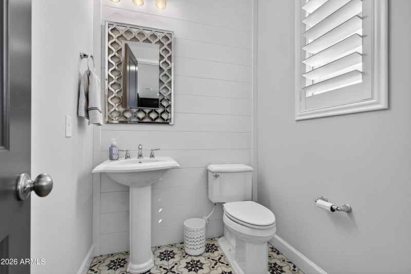 Upstairs powder room to living space