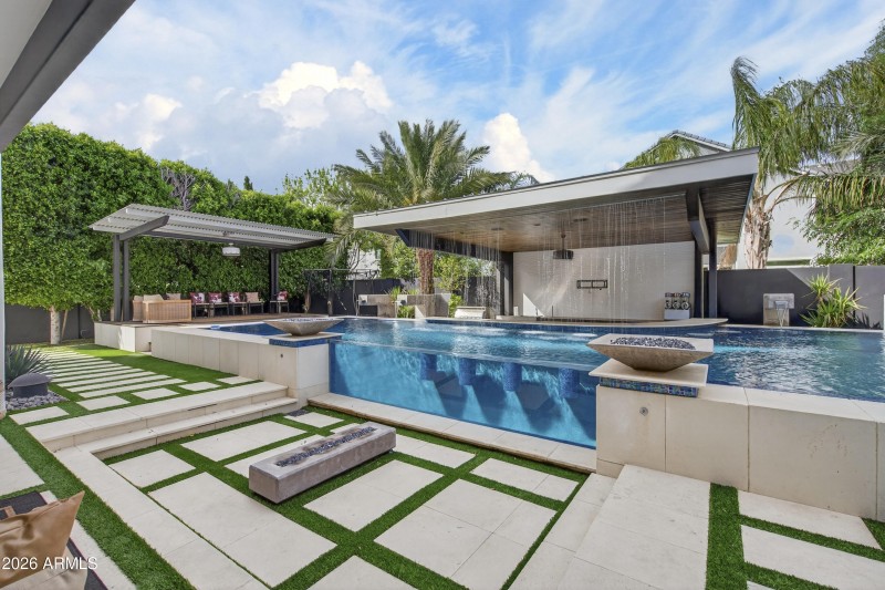 Fire bowls and fountains around pool