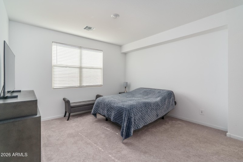 9) PRIMARY BEDROOM
