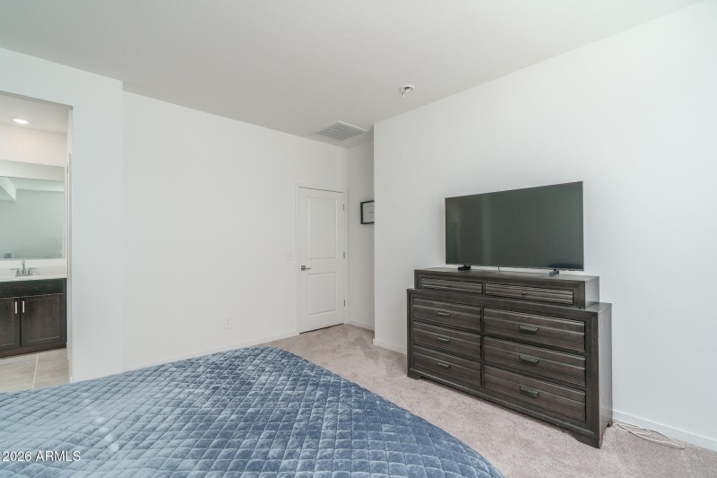 10) PRIMARY BEDROOM