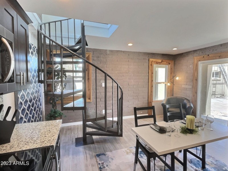 Kitchen, sitting area and block wall