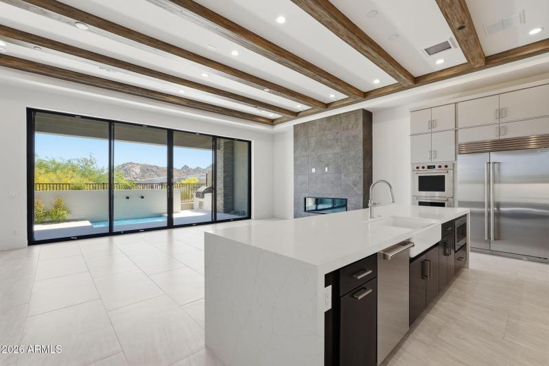 Kitchen & Great Room W Wall Fireplace