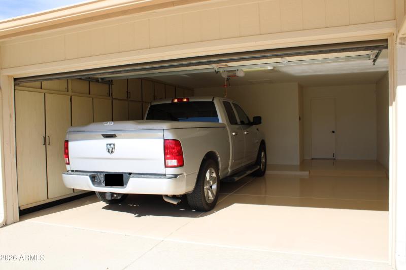 33 - 2 Car Garage Plus Golf Cart Area