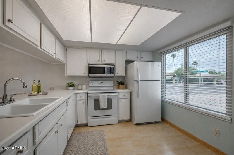 Modern kitchen with stainless steel acce