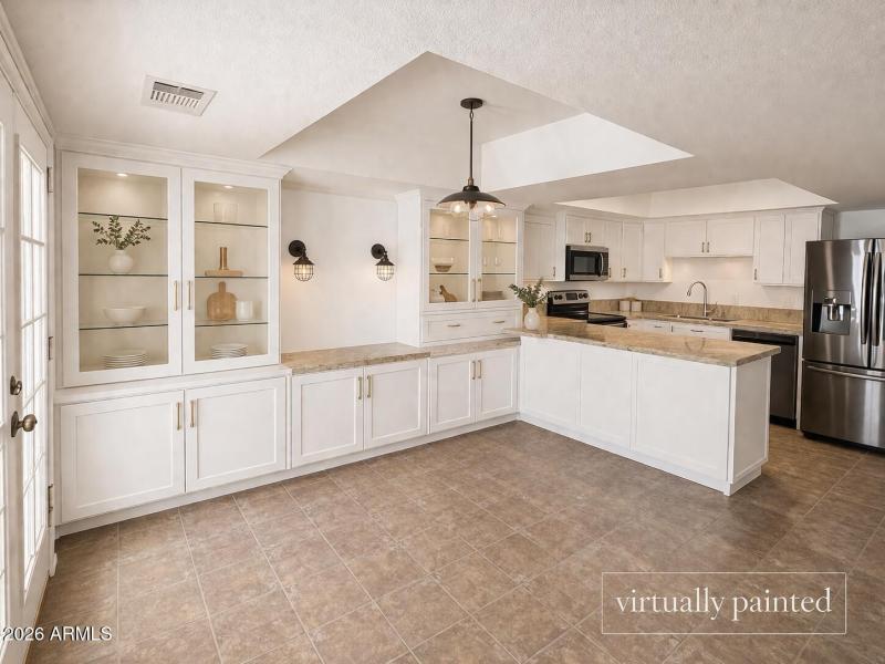 Modern kitchen with white cabinetry
