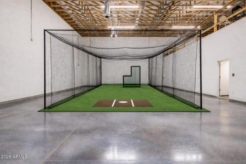Indoor batting cage in spacious facility
