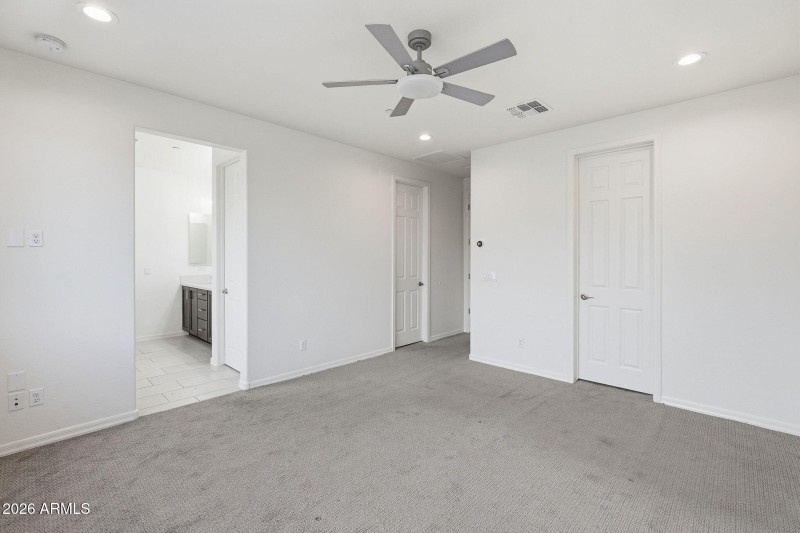 Master suite with 2 walk-in closets